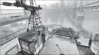  ?? JI JIN / CHINA DAILY ?? The Jialing River Cableway, a symbol of Chongqing, was last used in early 2011. Part of the cableway, currently being dismantled, will be preserved in a museum.