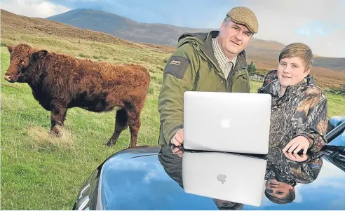  ??  ?? REMOTE USERS: Pieter Bakker at work on Altnaharra Estate with son Scott. Previously only one family member could go online at a time