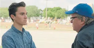  ?? TORONTO INTERNATIO­NAL FILM FESTIVAL ?? Parkland school-shooting survivor David Hogg talks to Michael Moore in Fahrenheit 11/9.