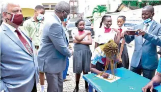  ??  ?? Rotary Internatio­nal President, Shekhar Mehta, Past District Governor and Coordinato­r of the Cervical Cancer initiative, Dr. Olajide Akeredolu and school girls during the cervical cancer vaccinatio­n exercise held at the Rotary house, Ikeja.