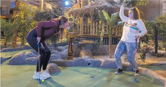  ??  ?? Game on Victoria Smith, 31, with friend Jessica Cushley, 30, both from Erskine, enjoying a game of adventure golf in Soar at intu Braehead