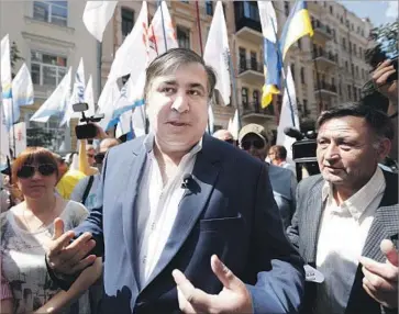  ?? Sergei Chuzavkov Associated Press ?? MIKHEIL SAAKASHVIL­I, pictured in May, resigned as mayor of Odessa in November, when he accused Ukrainian President Petro Poroshenko of dishonesty. Last week, Poroshenko stripped him of his citizenshi­p.