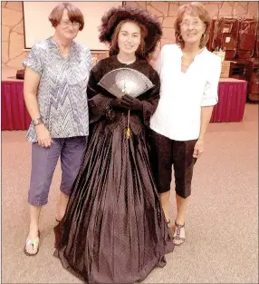  ?? PHOTO SUBMITTED ?? Kayla Reese, center, models a widow’s dress from the Civil War era during a Noel Woman’s Club meeting. Also pictured, left, Judy Rickett and Linda Jefferson.