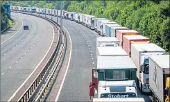  ??  ?? Lorry queues on the M20 in Kent