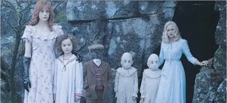  ?? JAY MAIDMENT/20TH CENTURY FOX/THE ASSOCIATED PRESS ?? Lauren McCrostie, left, Pixie Davies, Cameron King, Thomas and Joseph Odwell and Ella Purnell star in Miss Peregrine’s Home for Peculiar Children, the magical story of a boy who searches to find his place in the world.