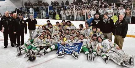  ?? Dave Phillips/For Hearst Connecticu­t Media ?? Notre Dame-West Haven celebrates after winning the SCC Division I hockey championsh­ip on Friday at Bennett Rink in West Haven.