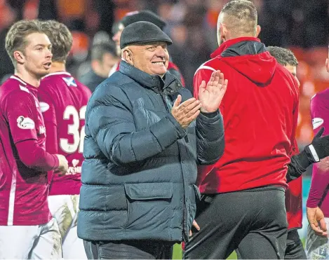  ?? Picture: SNS. ?? Dick Campbell celebrates Arbroath’s win at Tannadice in what has been a stellar season so far.