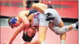  ?? Christian Abraham / Hearst Connecticu­t Media file photo ?? Fairfield Warde’s Nathan Cuoco, facing left, pulls down Danbury’s Matt Lucas during high school wrestling action in Fairfield on Feb. 4, 2020.