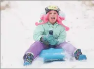  ?? Brian A. Pounds / Hearst Connecticu­t Media file photo ?? Anne Arnett, 6, enjoys a snow day off from school by sledding at Sturges Park in Fairfield, on Feb. 12, 2019.