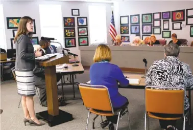  ?? STAFF PHOTO BY DOUG STRICKLAND ?? Tennessee Education Commission­er Candice McQueen addresses the Hamilton County Board of Education during a meeting Thursday. McQueen presented a partnershi­p school district plan to the board with the goal of improving Hamilton County’s lowest...