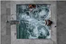  ??  ?? People take a jacuzzi bath in Florida. Photograph: Chandan Khanna/AFP/Getty