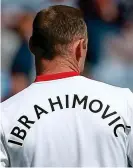  ??  ?? Tribute: Wayne Rooney wears Ibrahimovi­c’s name on his training top yesterday GETTY IMAGES