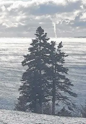  ??  ?? Steam rising off the water on a cold January day ... not uncommon. A winter waterspout ... priceless. Gloria Nickerson-brown spotted the spout last weekend in Beaver Harbour, N.B.