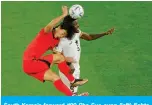  ?? ?? South Korea’s forward #09 Cho Gue-sung (left) fights for the ball with Ghana’s midfielder #05 Thomas Partey during the Qatar 2022 World Cup Group H football match on November 28, 2022.