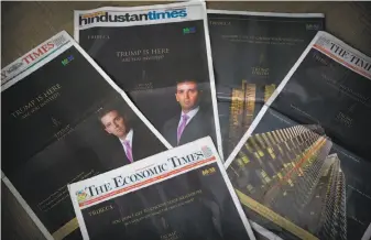  ?? Manish Swarup / Associated Press ?? Donald Trump Jr.’s image is on the cover of New Delhi papers. “Trump has arrived. Have you?” shout the barrage of front-page Trump Towers ads in almost every major Indian newspaper.
