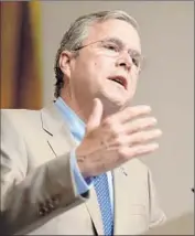  ??  ?? JEB BUSH has alluded to his decision to retire the Confederat­e f lag in Florida in 2001, when he was governor. He says it’s in “a museum, where it belonged.”