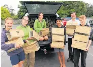  ?? Photo / Peter de Graaf ?? Handing over 100 rat traps for forest restoratio­n in the Mid North are Lucy Sizer (left), 14, Takou Bay; DoC community rangers Lizzie Smith and Maddy Powers; Kanwar Gill, 13, Kawakawa; Kiwi Coast Mid North co-ordinator Andrew Mentor; and William Blake, 14, Kerikeri.