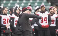  ?? Nathan Denette / Associated Press ?? Ottawa Redblacks head coach Rick Campbell directs his players during a team walk through of Commonweal­th Stadium in Edmonton, Alberta, on Saturday.