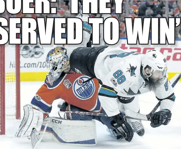  ?? POSTMEDIA FILE ?? The Sharks’ Brent Burns (right) collides with the Oilers goalie Cam Talbot (33) during second-period NHL playoff action at Roger Place on April 20, 2017.