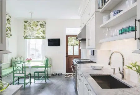  ??  ?? While blues and indigos have been huge in recent years, designer Marika Meyer says green is on the rise in everything from upholstery patterns to kitchen furniture — as in this Washington, D.C.-area breakfast nook designed by Meyer,.