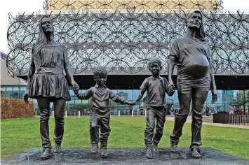  ?? ?? ‘A Real Birmingham Family’ statue was unveiled outside the Library of Birmingham