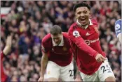  ?? DAVE THOMPSON — THE ASSOCIATED PRESS ?? Manchester United's Jadon Sancho celebrates after scoring his side's third goal during an English Premier League match against Leicester City at the Stamford Bridge stadium in Manchester, England, on Sunday.