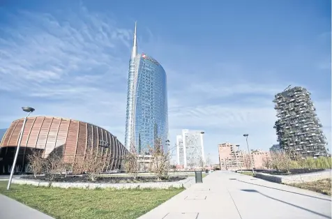  ?? REUTERS ?? A general view of UniCredit Tower and the ‘Bosco Verticale’ (Vertical Forest) residentia­l tower in Milan after the Italian government imposed a virtual lockdown on March 8.