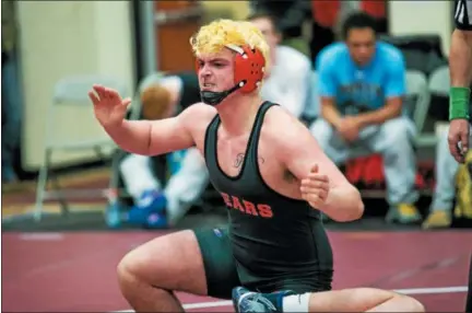  ?? NATE HECKENBERG­ER — FOR DIGITAL FIRST MEDIA ?? Boyertown’s Zak Reck celebrates after scoring a winning takedown against Council Rock South’s Gianni Gilch for a 4-2 win at 195 pounds.