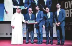 ??  ?? Mudassir Sheikha, CEO of Careem, receives a token of acknowledg­ement during the ‘CEO’s Legacy’ event.