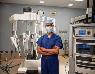  ?? CONTRIBUTE­D ?? Surgical oncologist Dr. Shyam Allamaneni performed Mercy Health-Cincinnati’s first fully robotic “Whipple surgery” on Weppler on March 1 at The Jewish Hospital, a groundbrea­king procedure for Stage 2 pancreatic cancer on a Ross Twp. man.