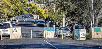  ?? LAWRENCE SMITH/STUFF ?? Boxes were put on Onehunga streets to make them safer for pedestrian­s and cyclists – but some drivers were furious.