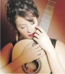  ??  ?? Acclaimed Cuban guitarist Iliana Matos performs Friday at the Phillip T. Young Recital Hall, University of Victoria.