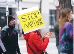  ?? Photo: AFP ?? A rally calls for an end to hate against Asian-Americans and Pacific Islanders in Seattle last year.