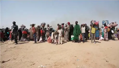  ?? ?? Des réfugiés soudanais.