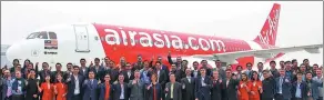  ?? PROVIDED TO CHINA DAILY ?? Officials from Airbus and Air Asia celebrate after the delivery ceremony for the A320neo aircraft in Tianjin on Wednesday.