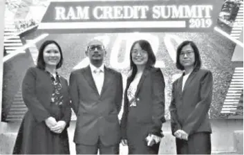  ??  ?? (From le ) RAM head of research Kristina Fong, Maybank Investment Bank Bhd group chief economist Suhaimi Ilias, Manulife Asset Management Services Bhd senior fixed income portfolio manager Eslie Tham and RAM head of sovereign ratings Esther Lai pose for a photo during RAM’s Annual Credit Summit 2019.