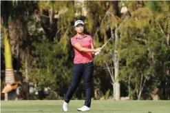  ?? —AFP ?? NAPLES: Lydia Ko of New Zealand plays her second shot on the first hole during the third round of the CME Group Tour Championsh­ip at Tiburon Golf Club yesterday in Naples, Florida.