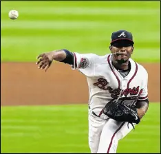  ?? CURTIS COMPTON / CCOMPTON@AJC.COM ?? Julio Teheran, delivering the first pitch against the Padres in the Braves’ home opener at shiny new SunTrust Park on Friday, was a given.