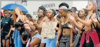  ?? Picture: GALLO IMAGES ?? LAID BARE: Rhodes students bare their breasts in protest against sexual violence after naming 11 alleged perpetrato­rs