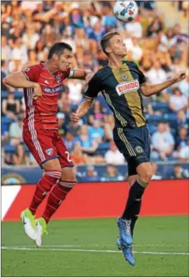  ?? MICHAEL REEVES — FOR DIGITAL FIRST MEDIA ?? Dallas’ Matt Hedges, left, pulls up as Union defender Jack Elliott tries to head the ball out of danger Saturday night at Talen Energy Stadium in Chester. The Union won 3-1.