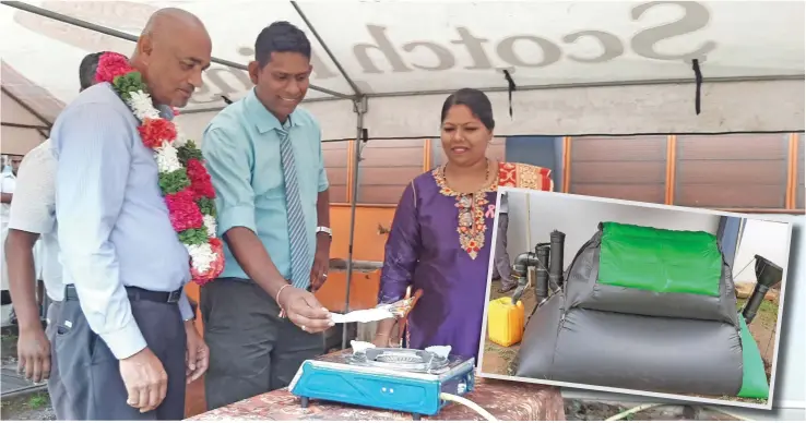  ?? Photo: Salote Qalubau ?? Lautoka City Council health director Gyneshwar Rao (with garland) and Central College Lautoka Principal Amant Lal (middle), test the new biogas project in Lautoka on October 8, 2019. INSET: The newly-commission­ed biogas project at Central College, Lautoka on October 8, 2019