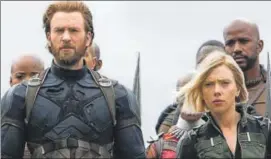  ??  ?? Actors Chris Evans and Scarlett Johansson play the roles of Steve Rogers aka Captain America and Natasha Romanoff aka Black Widow, respective­ly, in the Avengers film franchise