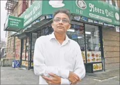  ??  ?? Fallout: Bobby Patel, whose Meera Deli is two blocks from the Amazon site, is hoping for new business, but that will depend on what gets built.