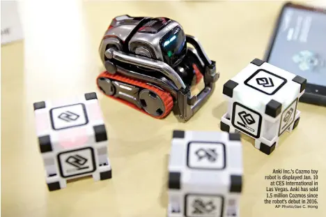  ?? AP Photo/Jae C. Hong ?? Anki Inc.’s Cozmo toy robot is displayed Jan. 10at CES Internatio­nal in Las Vegas. Anki has sold 1.5 million Cozmos since the robot’s debut in 2016.