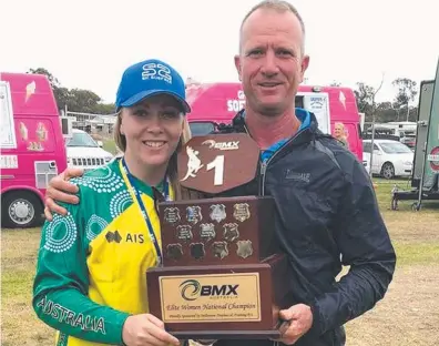  ??  ?? Nerang BMX Club's Erin Lockwood with coach Justin Lamb, Kira Hill (top right) and Michael Robinson are all national champions in their age groups.