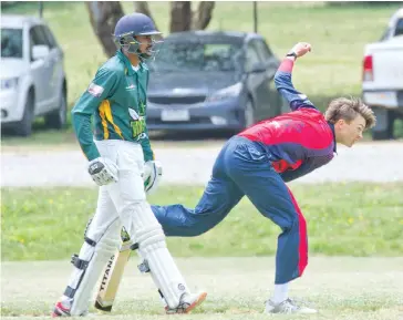  ??  ?? Left: Young gun Patrick Ireland lets loose with another delivery on Saturday afternoon, finishing with 1/40 from his nine overs.