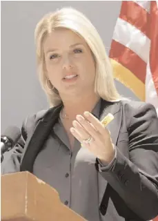  ?? AP PHOTO ?? Florida Attorney General Pam Bondi reacts after the Supreme Court’s decision. The state’s GOP governor, Rick Scott, said he would oppose the law’s implementa­tion.