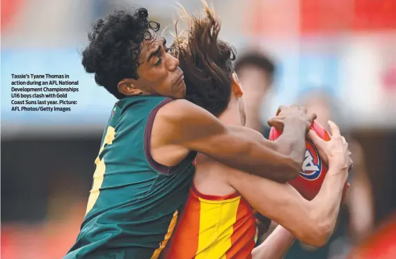  ?? ?? Tassie’s Tyane Thomas in action during an AFL National Developmen­t Championsh­ips U16 boys clash with Gold Coast Suns last year. Picture: AFL Photos/Getty Images