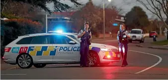  ?? STUFF ?? Police block the road near the scene of a fatal stabbing in Cheyenne St in Sockburn, Christchur­ch.