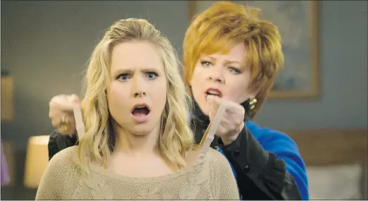  ?? UNIVERSAL PICTURES ?? Kristen Bell gets some bad advice about fashion and about life from Melissa McCarthy in The Boss.
